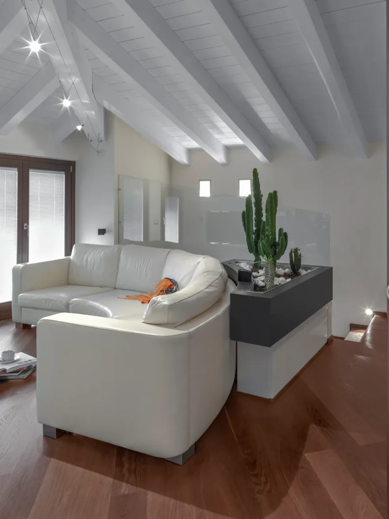 Corner sectional sofa maximizing seating in a small living room.